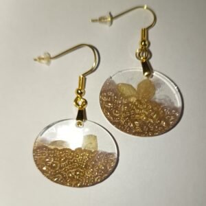 Boucles d'oreilles pendantes "Ovale beige" incrustation fleur