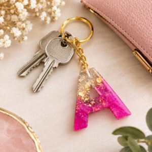 Porte-clés "Lettre A" Rose fuchsia et éclats dorés